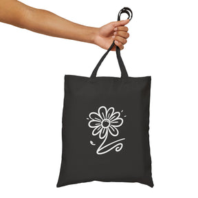 flower on a black tote bag