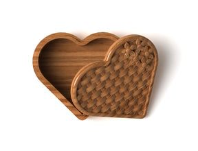 heart shaped jewelry organizer with a basket pattern and flowers design on the lid