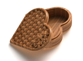 heart shaped jewelry organizer with a basket pattern and flowers design on the lid