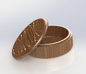 circular jewelry organizer with a diamond pattern engraved with the word love on the lid