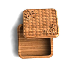 square jewelry organizer with a basket pattern and flowers design on the lid