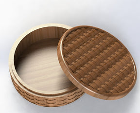 circular jewelry organizer with a basket pattern design on the lid and the body